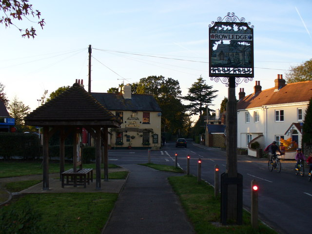 The Square in Rowledge with the village sign and Hare and Hounds pub, photographed in 2006